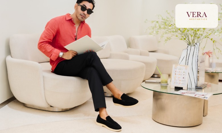 Man relaxing on a sofa at Vera Aesthetics Phnom Penh while reading about Botox for natural-looking expressions Man relaxing on a sofa at Vera Aesthetics Phnom Penh while reading about Botox for natural-looking expressions